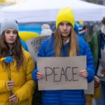 Protest against Russian invasion of Ukraine. People holding anti war sings and banners in street